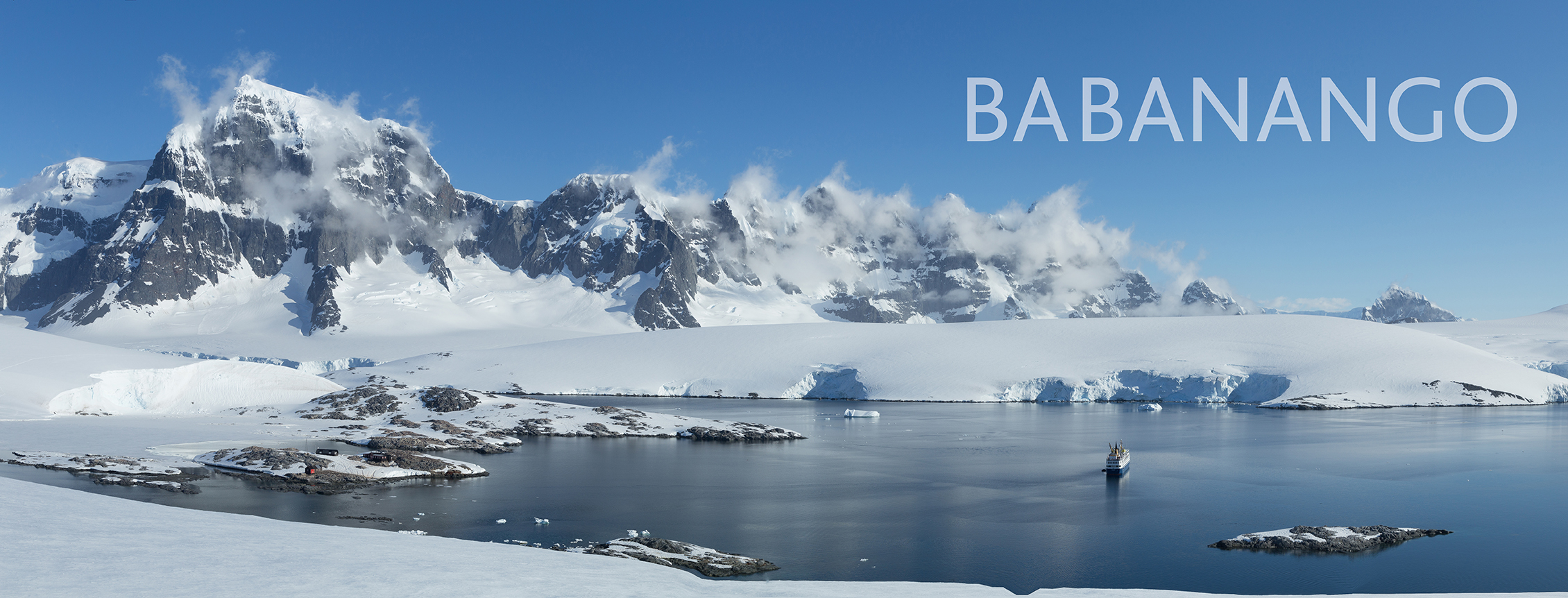 Antarctic landscape with glaciers, icebergs, mountains with text overlay.