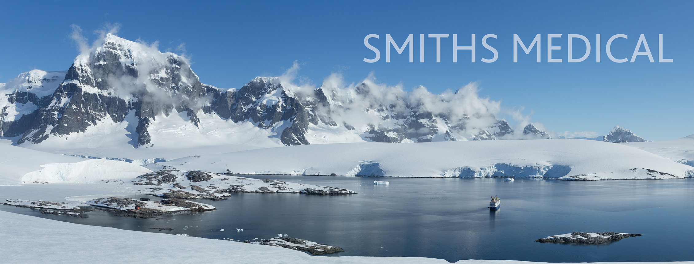 Antarctic landscape with glaciers, icebergs, mountains with text overlay.