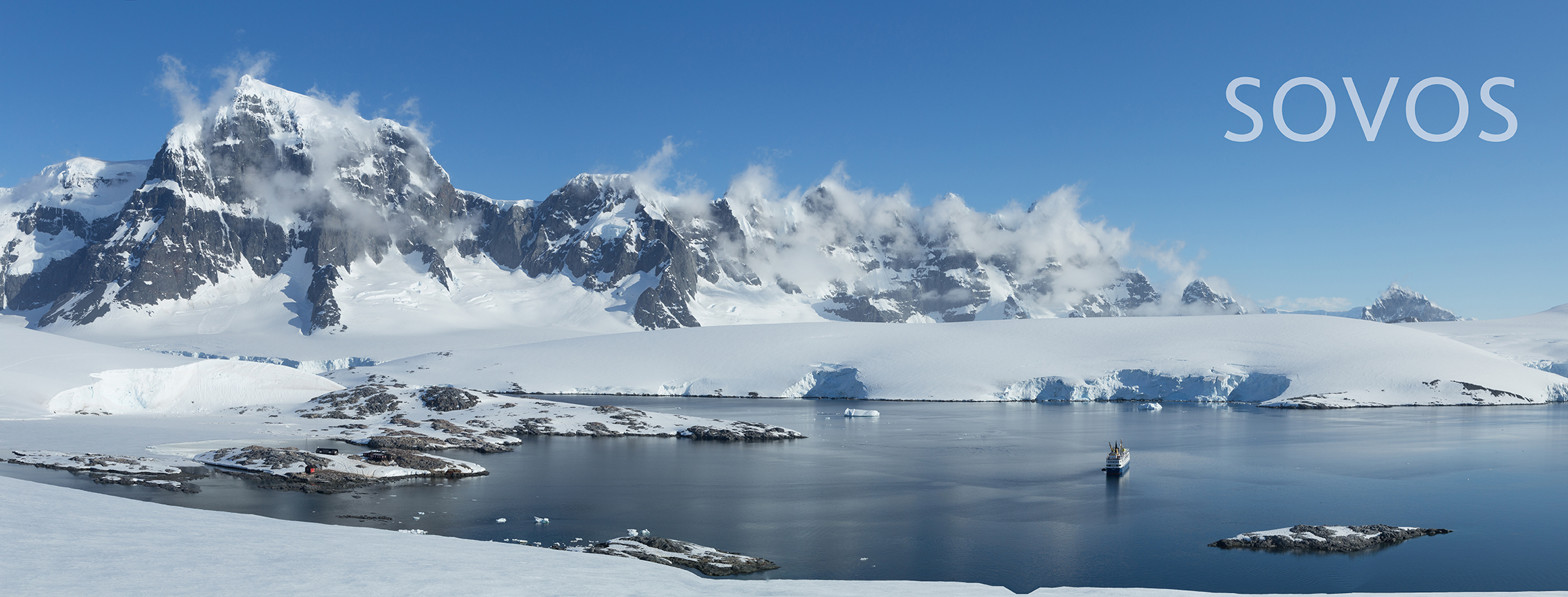 Antarctic landscape with glaciers, icebergs, mountains with text overlay.