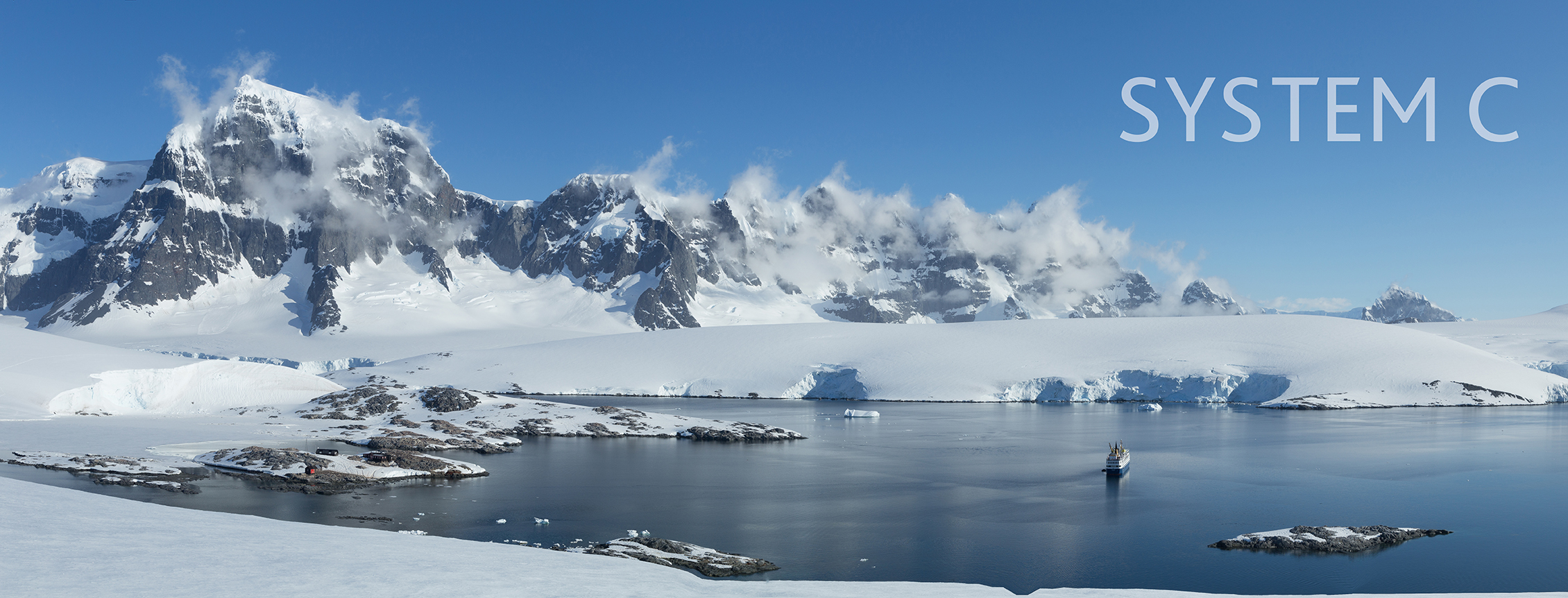 Antarctic landscape with glaciers, icebergs, mountains with text overlay.