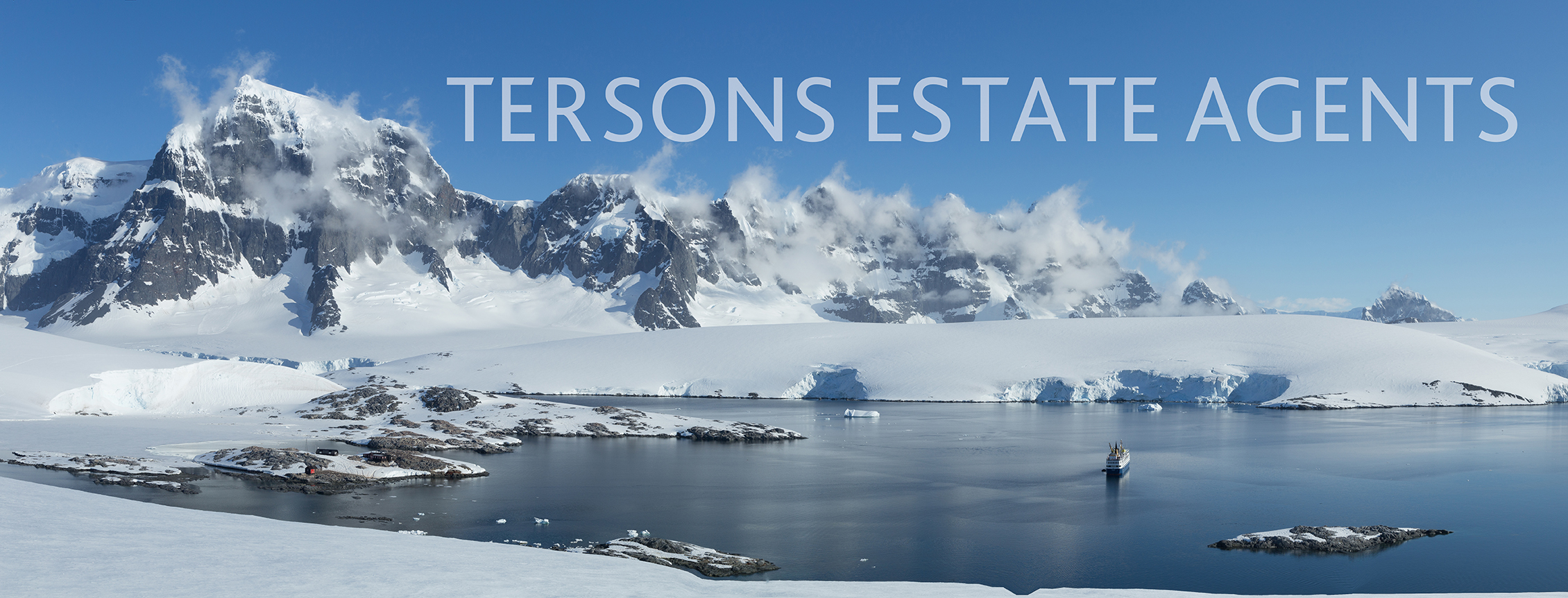 Antarctic landscape with glaciers, icebergs, mountains with text overlay.