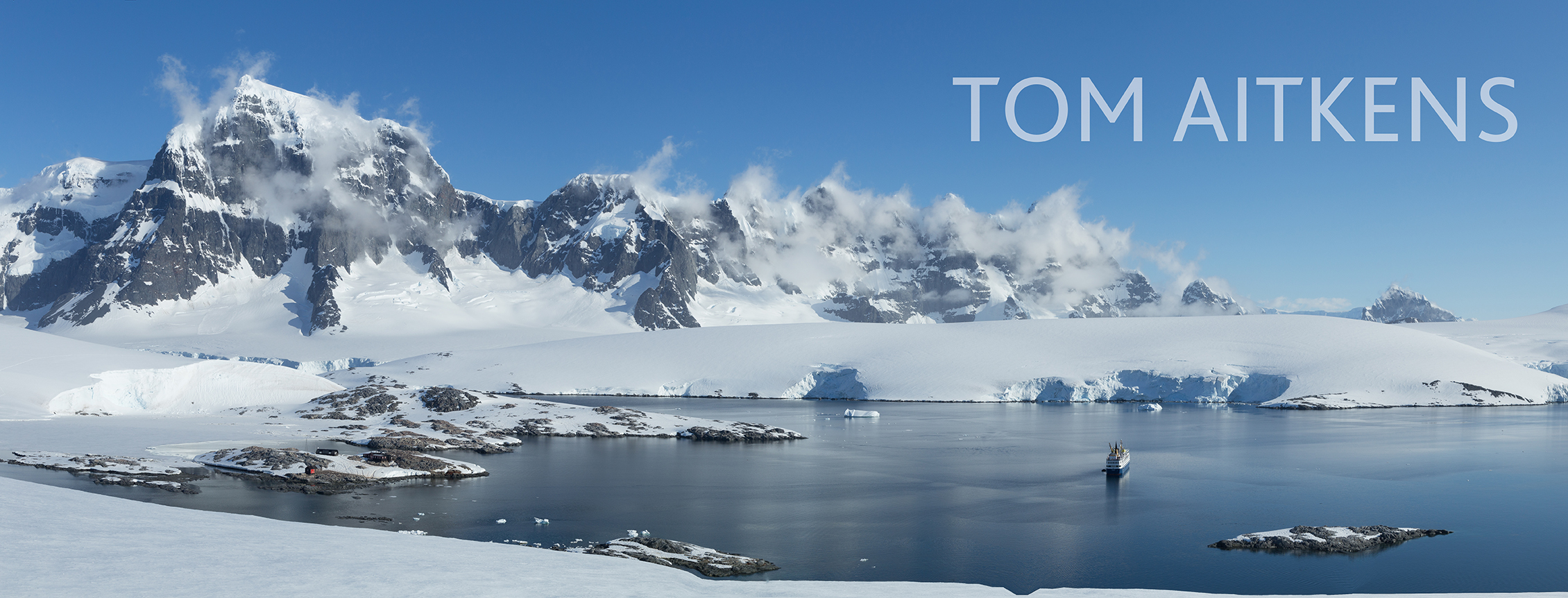 Antarctic landscape with glaciers, icebergs, mountains